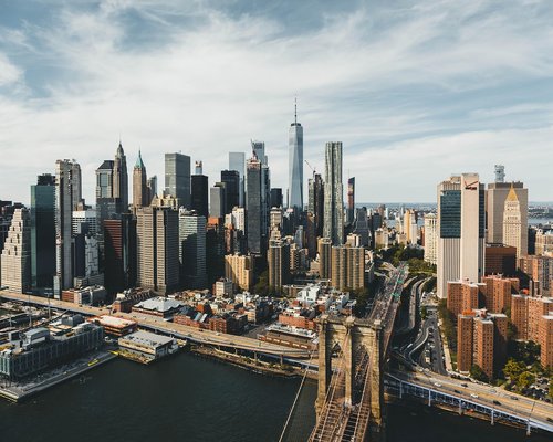 Expansive view of Melbourne city skyline along the river